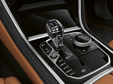 Close up of a BMW gear shifter with optional Glass Controls