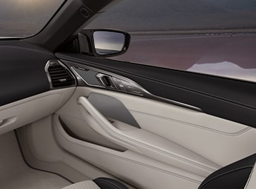 Interior detail of the front passenger cabin in the 2026 BMW 8 Series Convertible