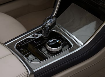 Detailed view of the driver's controls of a 2026 BMW 8 Series Convertible
