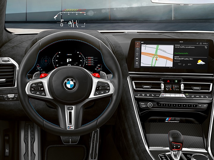 Driver controls of the 2025 BMW M8 Competition Gran Coupe including M-specific Head-up Display