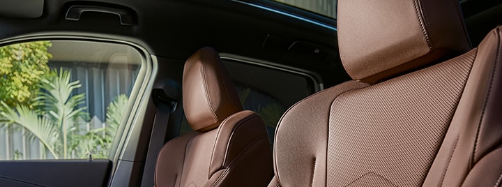 Angled closeup view of the seats and Panoramic Moonroof of X1 SUV