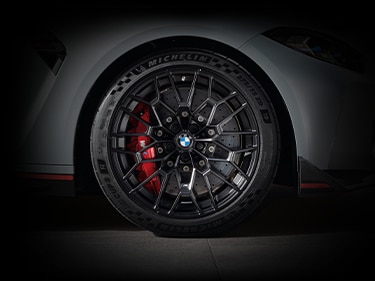 Detail of M Carbon Ceramic Brakes with red calipers and Michelin® Pilot® Sport Cup 2 R tires